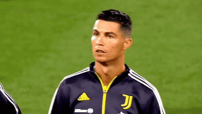 Man In Blue Shirt Holding Knife GIF
