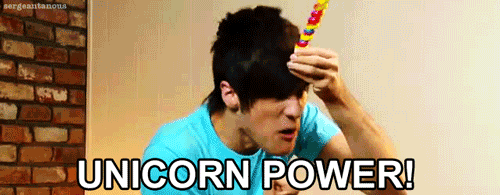 Man In Blue Shirt Holding Lollipop Forehead Unicorn Power GIF