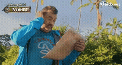 Man In Blue Shirt Holding Paper Saying Avance GIF