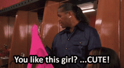 Man In Blue Shirt Holding Pink Shirt Saying You Like This Girl GIF