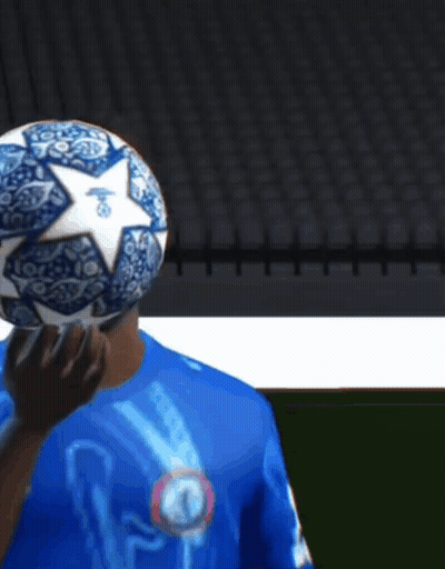 Man In Blue Shirt Holding Skull Soccer Ball GIF