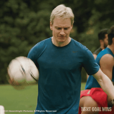 Man In Blue Shirt Holding Soccer Ball Next Goal Wins GIF