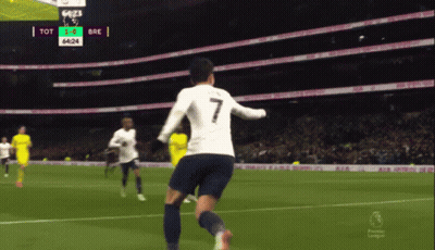 Man In Blue Shirt Holding Soccer Ball With Skull GIF