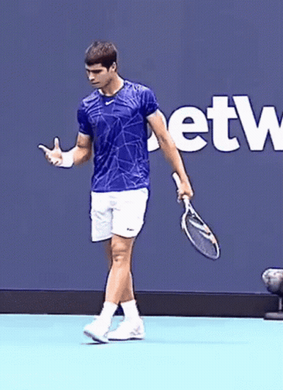 Man In Blue Shirt Holding Tennis Racket Saying Etw GIF
