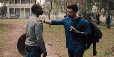 Man In Blue Shirt Hugging Another Man GIF