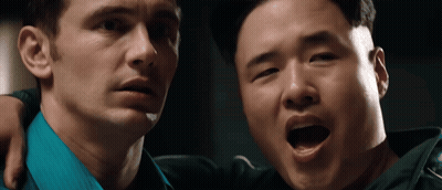 Man In Blue Shirt Hugging Another Man GIF