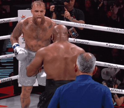 Man In Blue Shirt In Boxing Ring GIF