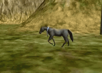 Man In Blue Shirt In Front Of Cannon GIF