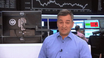 Man In Blue Shirt In Front Of Two Dell Monitors GIF