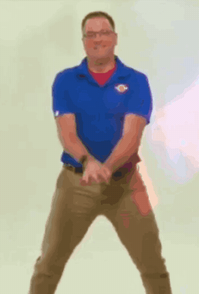 Man In Blue Shirt Khaki Pants Arms Outstretched GIF