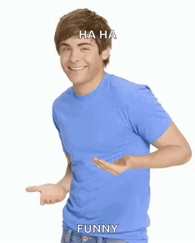 Man In Blue Shirt Laughing And Pointing Saying Ha Ha Funny GIF