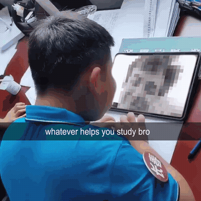 Man In Blue Shirt Looking At Tablet Saying Whatever Helps You Study Bro GIF