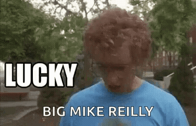 Man In Blue Shirt Looking Down Eyes Closed GIF