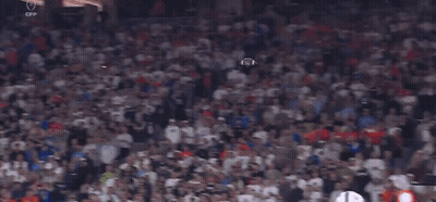 Man In Blue Shirt Looking Under Sink GIF