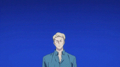 Man in Blue Shirt Looking Up at Blue Sky