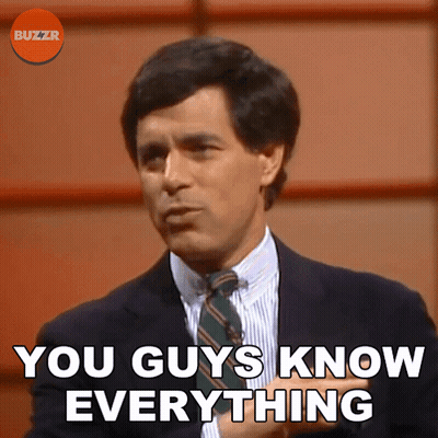 Man In Blue Shirt Looking Up At Blue Sky GIF
