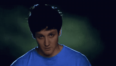 Man In Blue Shirt Making A Face GIF