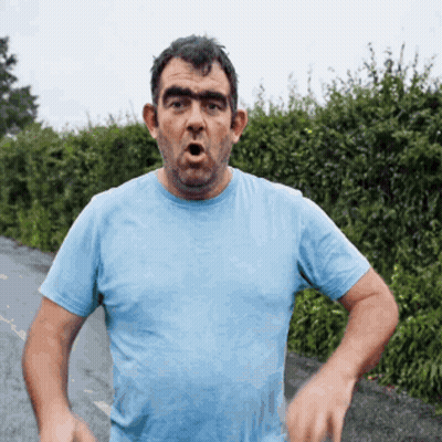 Man In Blue Shirt Making Funny Face GIF