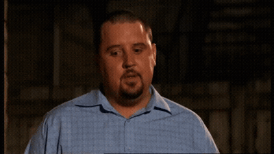 Man In Blue Shirt Making Funny Face GIF