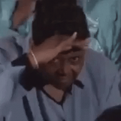 Man In Blue Shirt Making Funny Face GIF