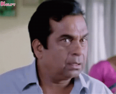 Man In Blue Shirt Making Funny Face GIF