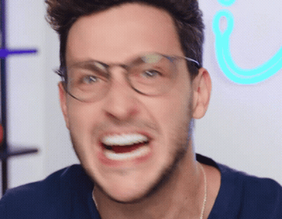 Man In Blue Shirt Making Funny Face GIF
