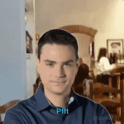 Man In Blue Shirt Making Pfft Face GIF