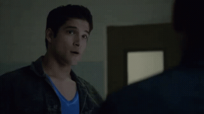 Man In Blue Shirt Next To Another Man GIF