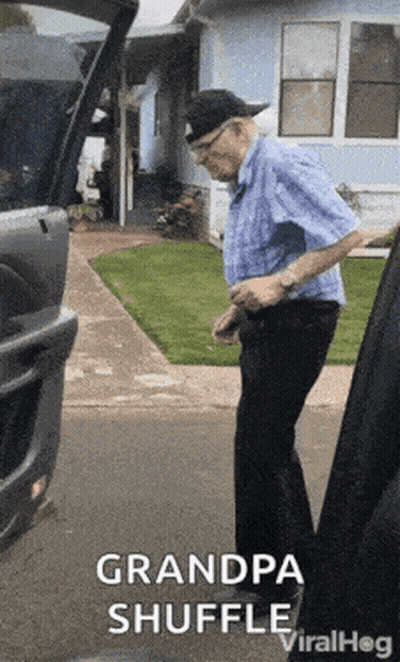 Man In Blue Shirt Next To Car GIF
