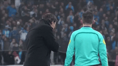 Man In Blue Shirt Next To Man In Black Jacket GIF