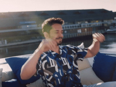 Man In Blue Shirt On Boat Arms Outstretched GIF