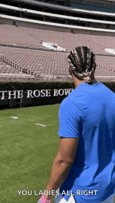 Man In Blue Shirt On Football Field GIF