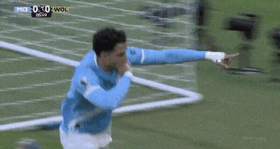 Man In Blue Shirt On Soccer Field With Sky Sports Logo GIF
