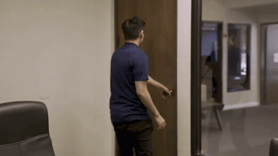 Man In Blue Shirt Opening Door GIF