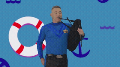 Man In Blue Shirt Playing Bagpipe With Life Preserver GIF