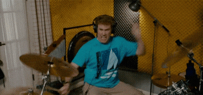 Man In Blue Shirt Playing Drums GIF