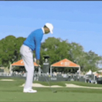 Man In Blue Shirt Playing Golf GIF