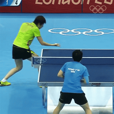 Man In Blue Shirt Playing Ping Pong GIF