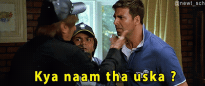 Man In Blue Shirt Pointing At Another Man Kya Naam Tha Uska GIF