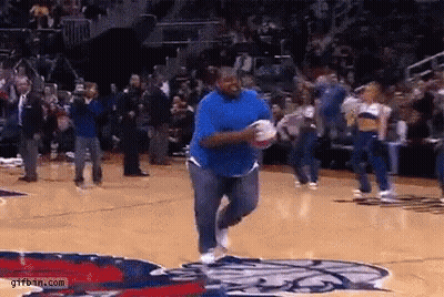 Man In Blue Shirt Running With Basketball GIF