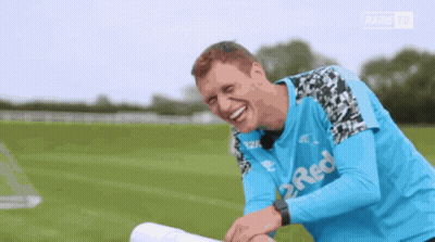 Man In Blue Shirt Saying 2 Red Laughs GIF
