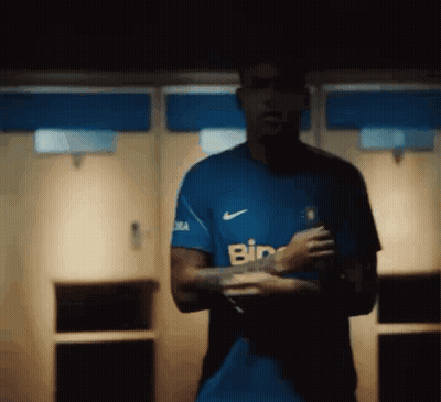 Man In Blue Shirt Saying Bin GIF