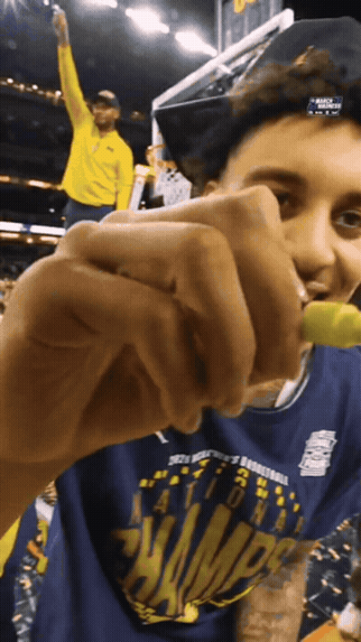 Man In Blue Shirt Saying Champions GIF