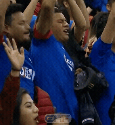 Man In Blue Shirt Saying Cruz In Crowd GIF