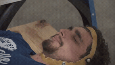 Man In Blue Shirt Saying Jokes On You I'm Not Ticklish Laying Down GIF