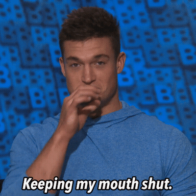 Man In Blue Shirt Saying Keeping My Mouth Shut GIF