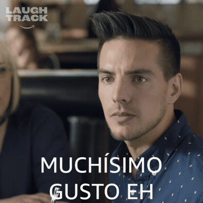 Man In Blue Shirt Saying Muchisimo GIF