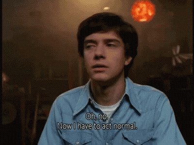 Man In Blue Shirt Saying Oh No Now I Have To Act Normal GIF