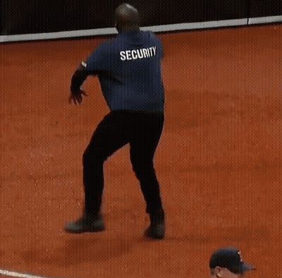 Man in Blue Shirt Saying Security