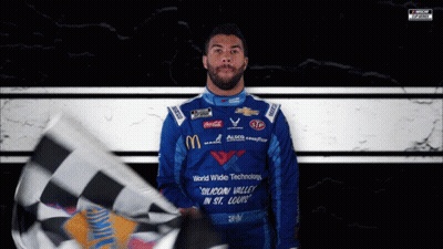 Man In Blue Shirt Saying Silicon Valley In St. Louis Holding Checkered Flag GIF